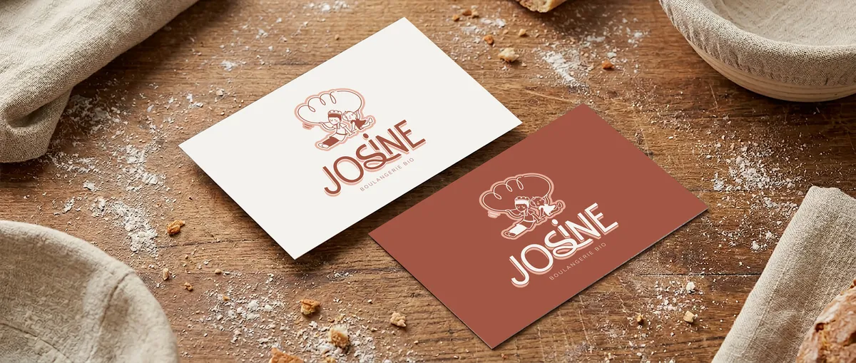 Le logo Josine : le nom de la boulangerie et ses deux petits personnages, Joseph et Maxine, sur une carte