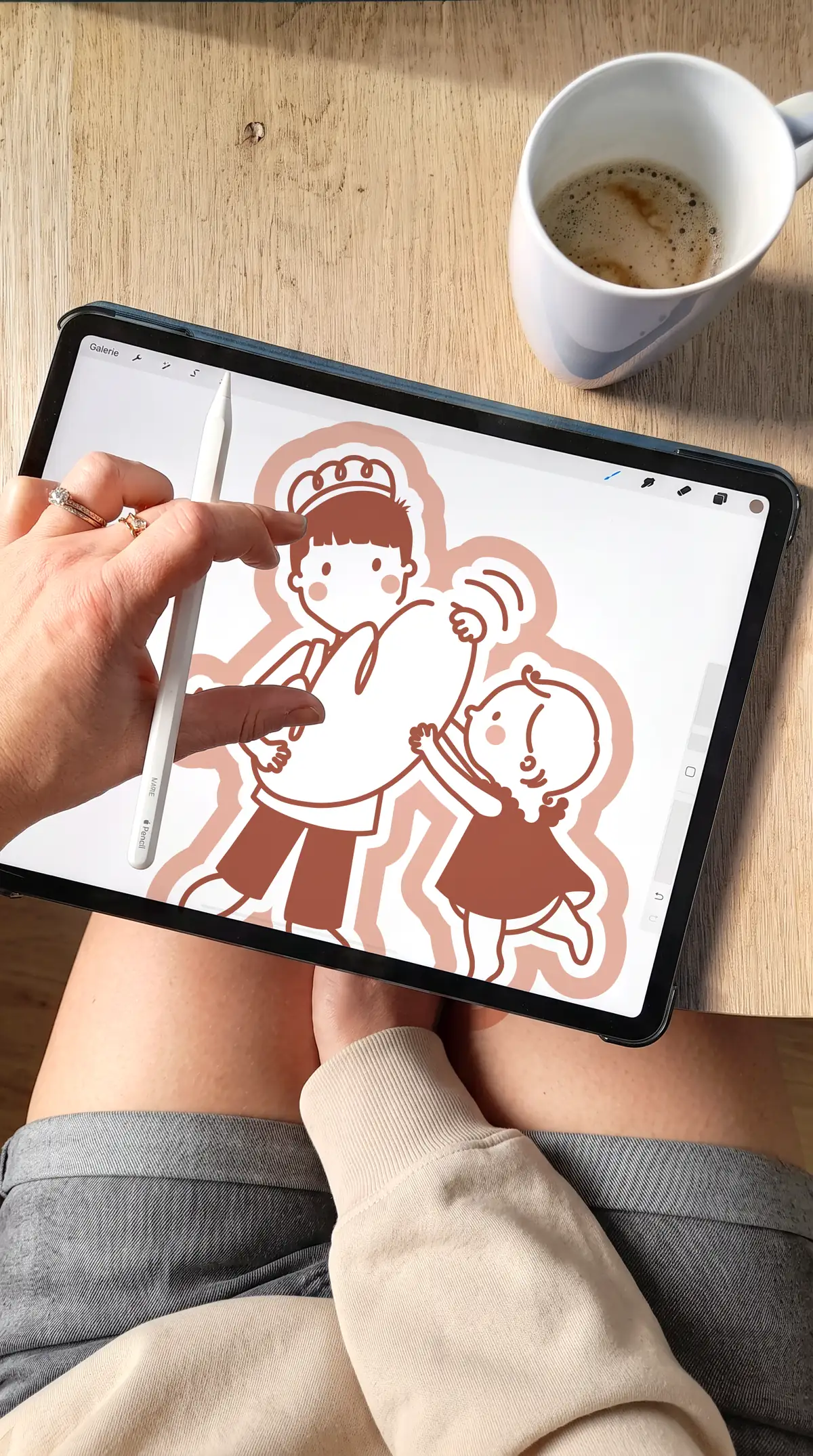 Les deux enfants dessinés à la tablette, l'un portant une miche, l'autre tendant la main
